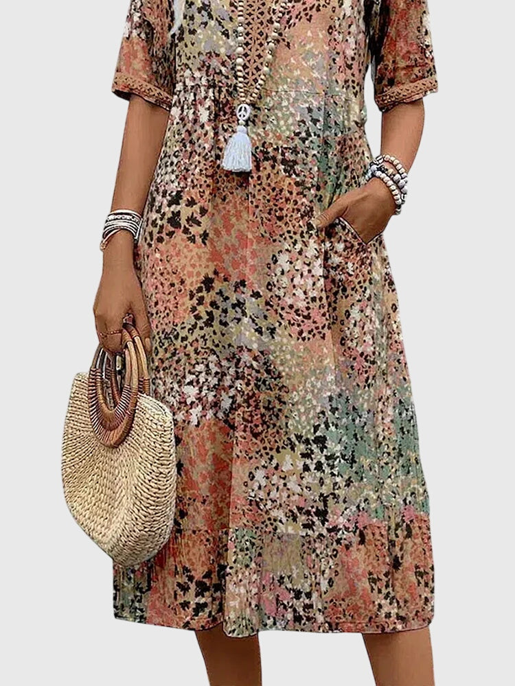 Jenna | Dames midi-jurk met print en V-hals
