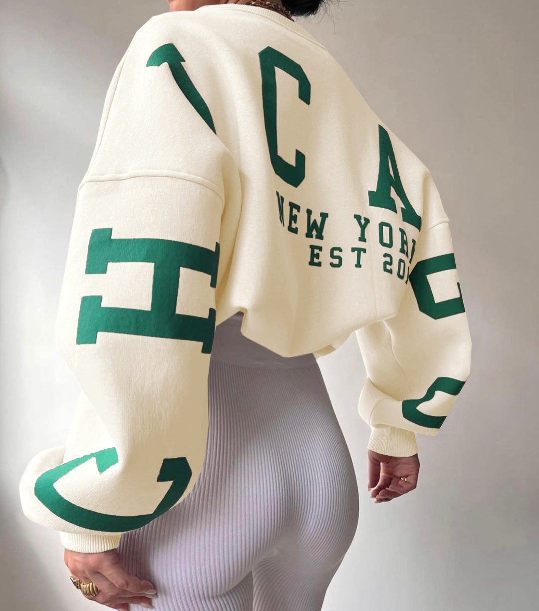 Dames Oversized Varsity-Print Fleece Crewneck Sweater