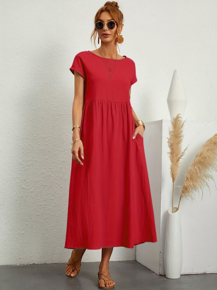 Dahlia | Dames Korte Mouwen Losse Midi Jurk Met Zakken
