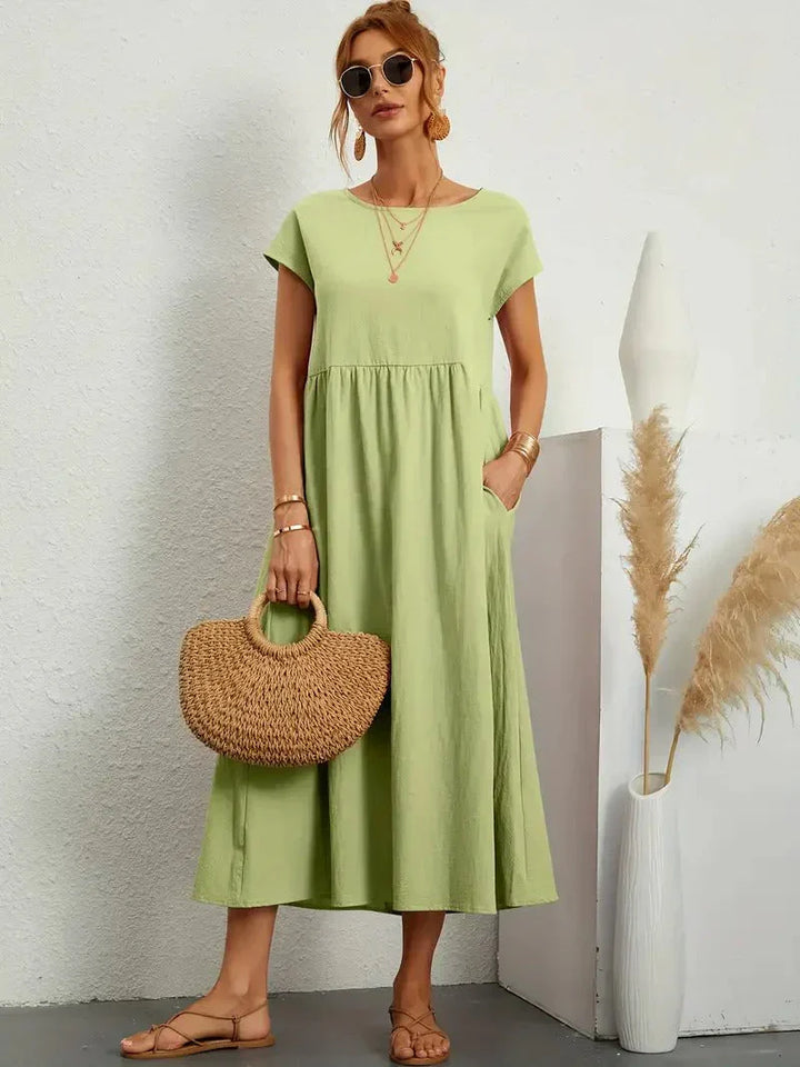 Dahlia | Dames Korte Mouwen Losse Midi Jurk Met Zakken