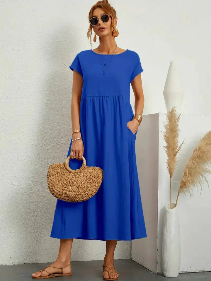 Dahlia | Dames Korte Mouwen Losse Midi Jurk Met Zakken