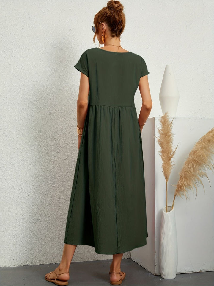 Dahlia | Dames Korte Mouwen Losse Midi Jurk Met Zakken